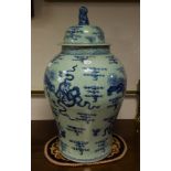 PAIR OF CHINESE STYLE BLUE + WHITE BALISTER SHAPE JARS + COVERS 21"