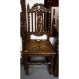 PAIR OF CARVED OAK HALL CHAIRS