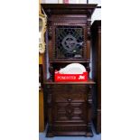 CARVED OAK LEADED GLASS CABINET