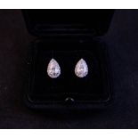 PAIR OF DIAMOND PEAR SHAPED STUD EARRINGS. 1.