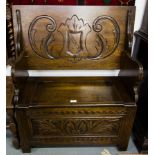 CARVED OAK MONKS BENCH