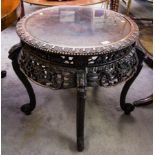 ROUND HEAVILY CARVED TABLE WITH GLASS TOP