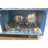 One bin of silver plate table articles including flatware, a gravy boat, a charger, etc.