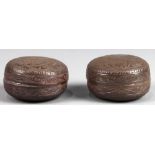 (lot of 2) Chinese circular metal boxes, one hammered with floral scrolls; and the other with a a