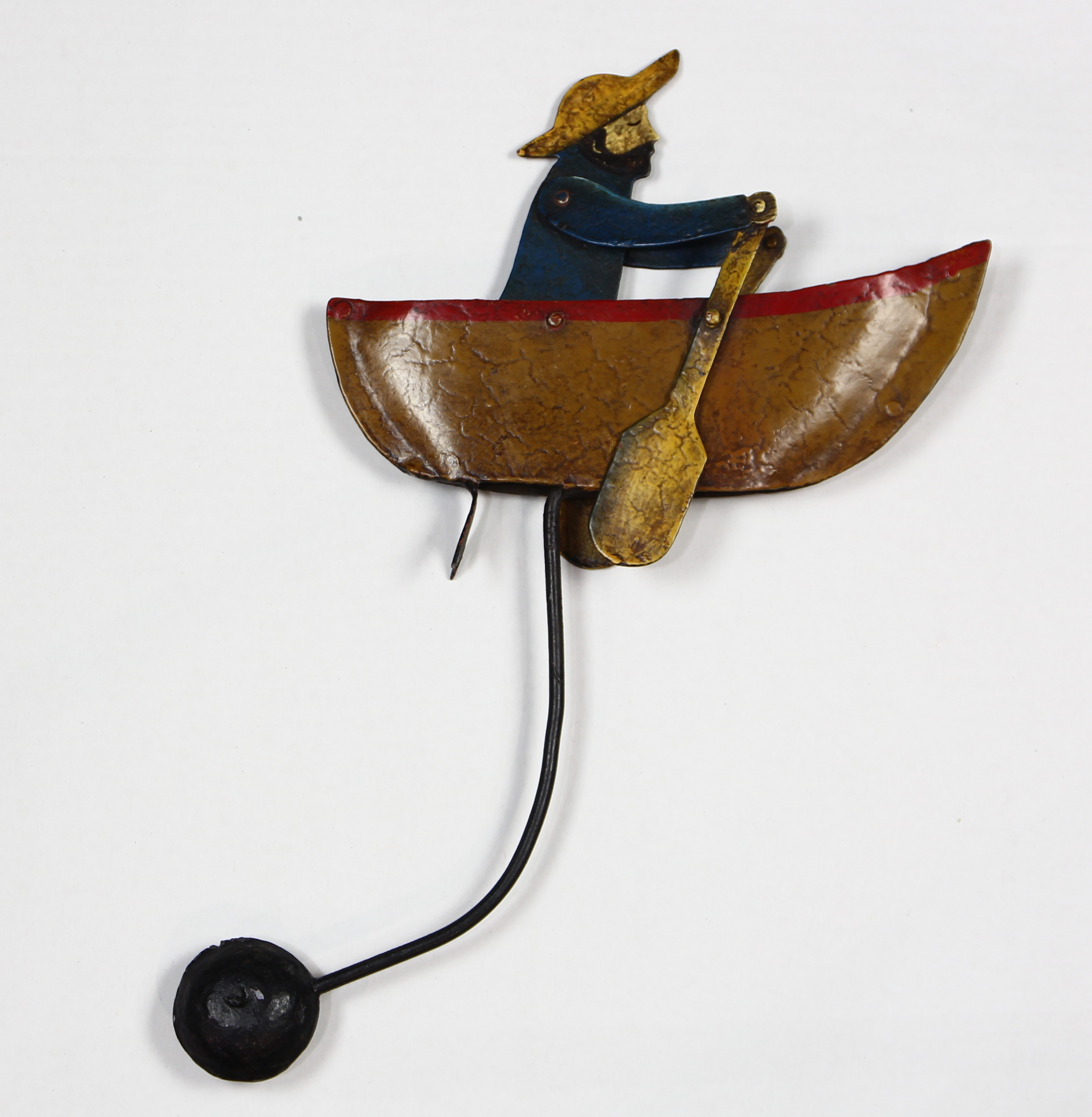 Antique wrought metal and polychrome decorated whirligig, depicting a sailor rowing his boat, 14.5"h