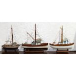 (lot of 3) Model boat group, consisting of three fishing boats, each hand-painted, with rigging