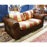 Ralph Lauren settee, having a woven frame, 28.5"h x 66"w x 37"d