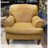 Ralph Lauren leather club chair, rising on round tapering fluted legs, 39"h