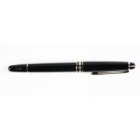 Mont Blanc Classique rollerball pen, having a black resin body accented with white metal and with