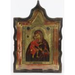 Russian Icon on panel, gilt and polychrome decorated depicting the Mother and Child, the back of