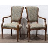 Pair of Art Nouveau fauteuils circa 1900, each having a contoured high back, with carved arms and