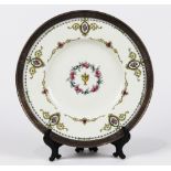 Royal Worcester porcelain charger with applied sterling silver rim, distributed by Shreve & Co.,