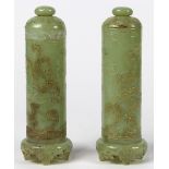 Pair of Chinese hardstone lidded vessels, each of cylindrical form with incised dragon and phoenix