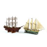 (lot of 2) Full-masted model ship group, one depicting the sailing ship "La Bonte", each hand-