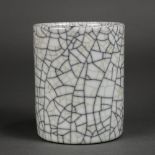 Chinese Guan-type porcelain brush pot, of cylindrical form with a network of dark russet crackles on