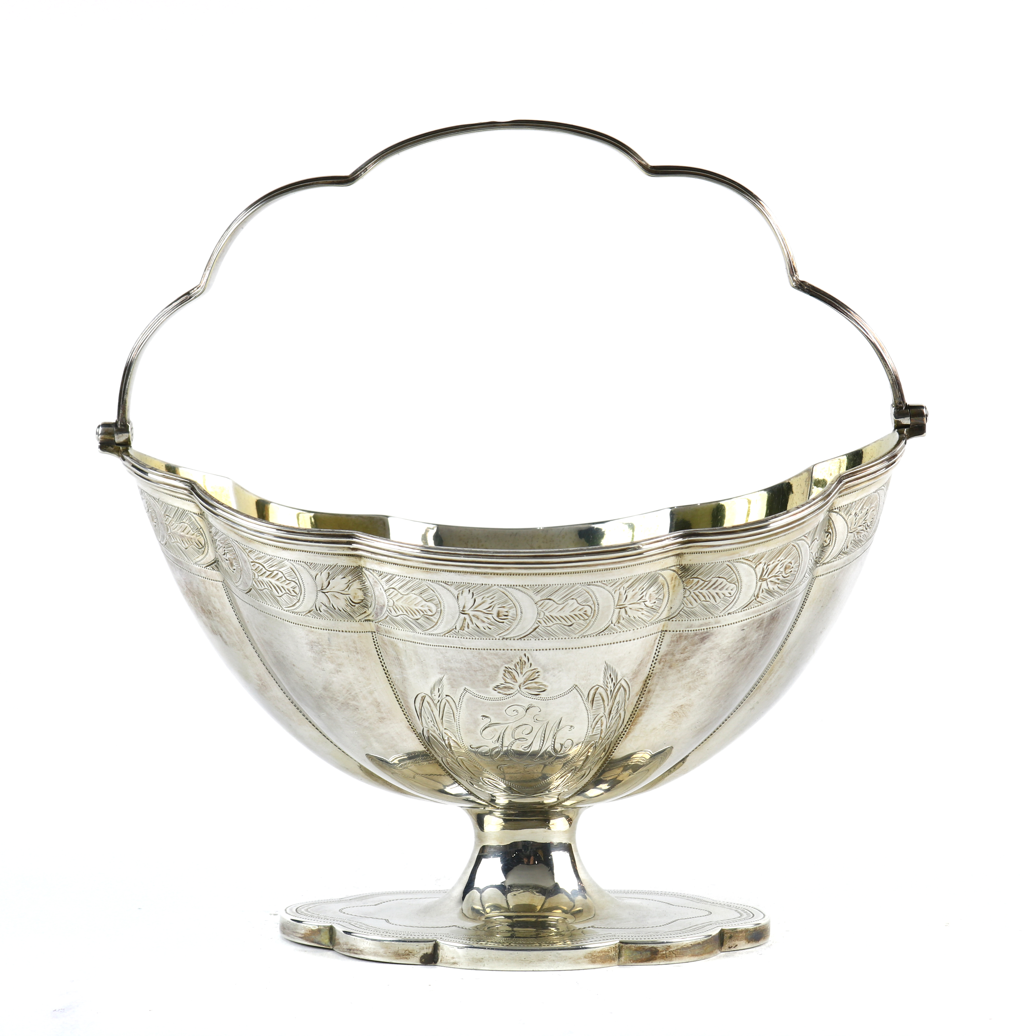 George III sterling silver swing handle sugar basket, London, 1797, by Solomon Hougham, having a