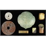 (lot of 7) Chinese archaistic hardstone carvings, including two bi-disc, one with chilong and the