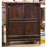 Chinese lacquered wood cabinet, fronted by hinged double doors fronted by a central removable stile,