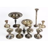 (lot of 13) Sterling silver weighted table articles, consisting of single-light candlesticks in