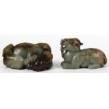 (lot of 2) Chinese hardstone carvings: first of a qilin in recumbent form; second, of three rams