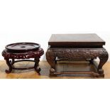 (lot of 2) Chinese carved wooden stands, one of square form decorated with dragons on the apron; the