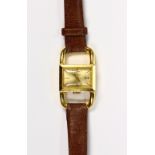 Lady's Jaeger Le Coultre, 18k yellow gold drivers wristwatch Dial: rectangular, gold tone,