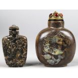 (lot of 2) Chinese stone snuff bottles, of terratella with a tapering flattened body carved with