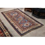 Antique Kazak carpet, 4'4" x 8'