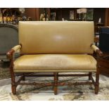 Ralph Lauren Jacobean style settee, of rectangular form, having an upholstered leather high back and