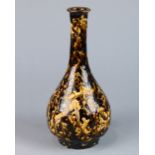Chinese glazed ceramic vase, with a rolled rim and cylindrical neck above a pear shaped body