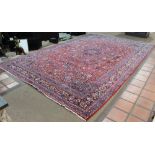 Semi Antique Persian Kashan carpet, signed, 12' x 18'6"