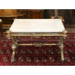 Giltwood Renaissance Revival library table, having a carerra marble inset top, drop finials and