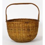 Large Nantucket basket, executed in wood and rattan, having a hinged bentwood handle, unsigned, 8.