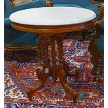 Victorian Eastlake marble top occasional table, having an oval form with stepped skirt, on four