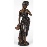 Art Nouveau style bronze sculpture, depicted as a beauty holding a basket of flowers, 19"h