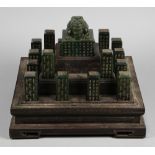 Set of Chinese hardstone seals, of 17 dark green seals carved with Chinese and Manchu script, the