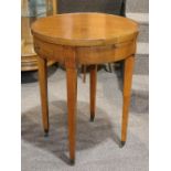 Federal style tea table, the circular top having opposing frieze drawers, the sides with pull out