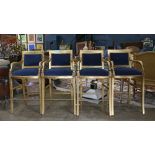 (lot of 4) Regency style giltwood bar stools, having an upholstered back and seat in deep navy blue,