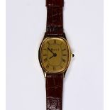 Lady's Piaget 18k electroplated wristwatch Dial: oval gold tone, black Roman numeral hour markers,