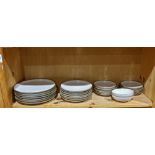 One shelf of Heath Ceramics table items, consisting of (7) dinner plates, 10.5"dia.; (7) salad