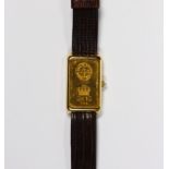 Corum gold ingot, 18k yellow gold wristwatch Dial: rectangular, Union Bank of Switzerland, 999.9