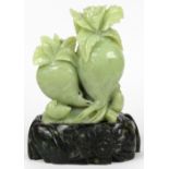 Chinese hardstone carving, of radish and birds executed from a celadon green matrix, with stone