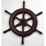 Brass and turned wood ship's wheel, likely removed from a yacht's helm, 24"w. Provenance: Property