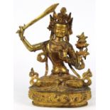 Sino-Tibetan copper alloy Manjusri, seated on a lotus pedestal, holding a sword and a lotus sprig