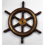 Brass and turned wood ship's wheel, likely removed from a yacht's helm, 24"w. Provenance: Property