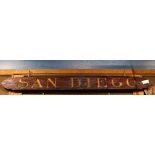 San Diego carved nameboard, with gilt lettering, 11.5"h x 128"w Property from the Spenger's Fish