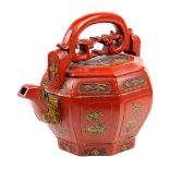 Chinese gilt red lacquered wooden teapot holder, of octagonal form with floral reserves, the lid