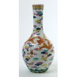 Chinese enameled porcelain stickneck vase, the globular body featuring meandering dragons of pink,