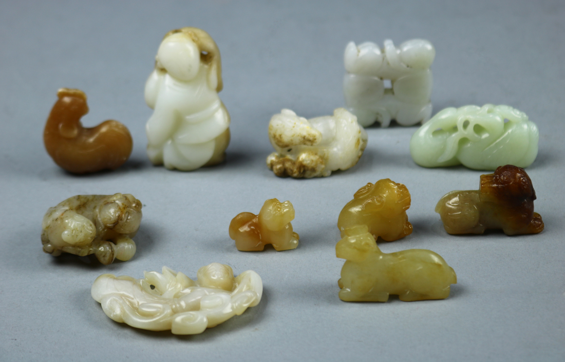 (lot of 11) Group of Chinese hardstone carvings, including one with a pair of ducks; a rooster;