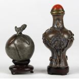 (lot of 2) Chinese metal snuff bottles, the first a peach form pewter bottle; the second, of